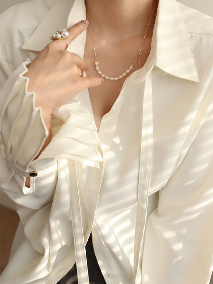 Pileli Manşet Yaka Bağcıklı Düğmeli Gömlek