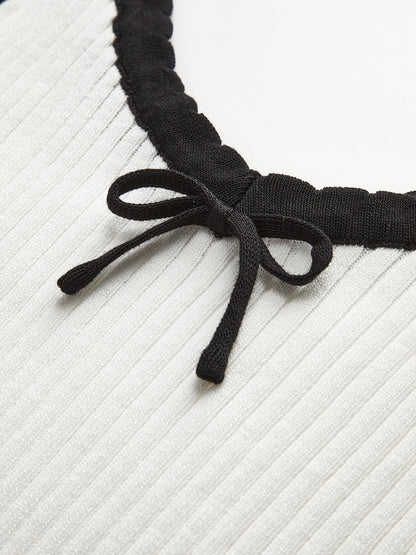 Kontrast Kesim Fiyonklu Kırpılmış Kazak Yelek