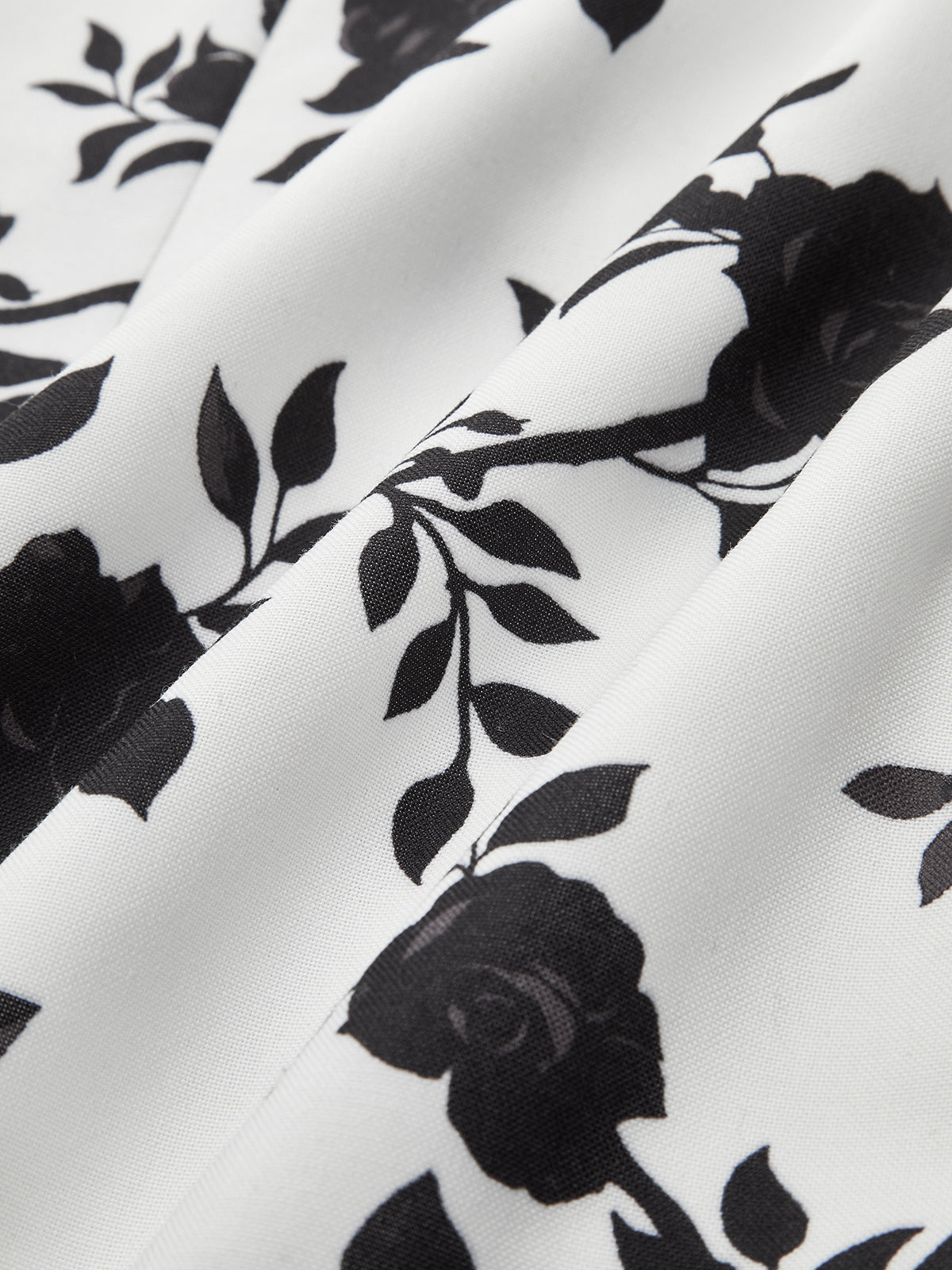 Çiçek Desenli Sırtı Açık Kloş Elbise