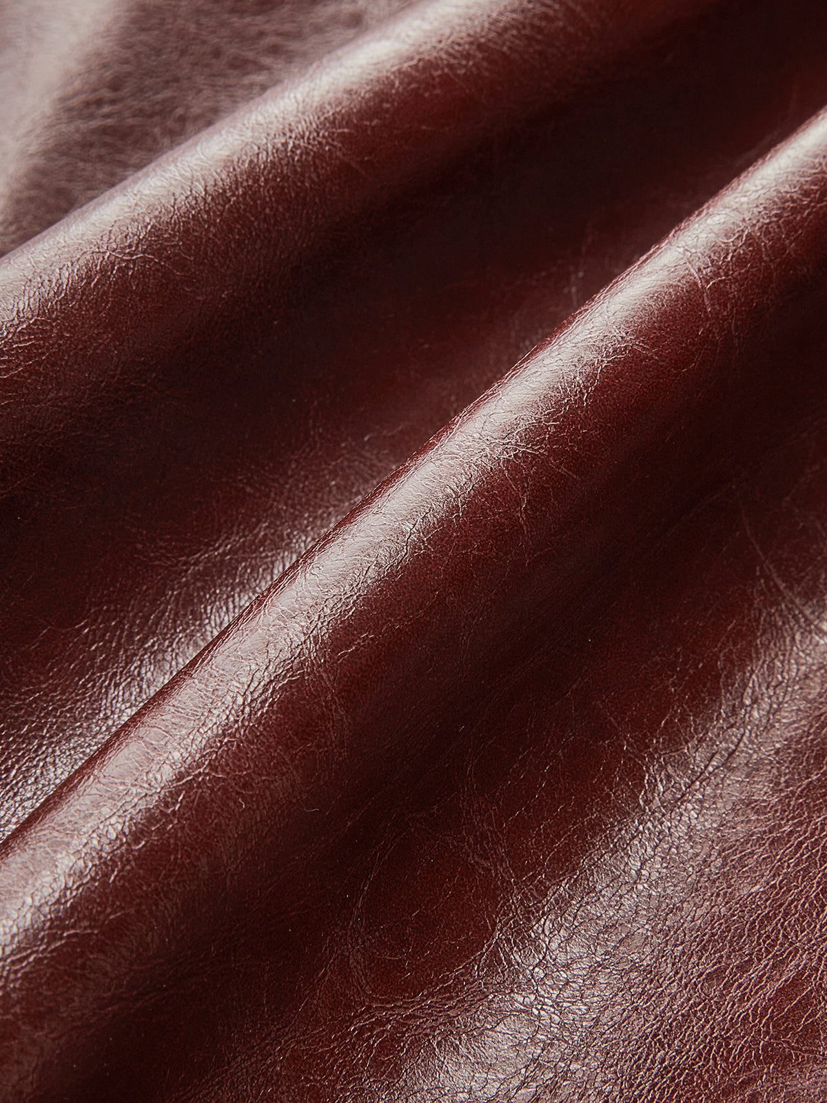 Düğüm Detaylı Yırtmaçlı Suni Deri Midi Etek